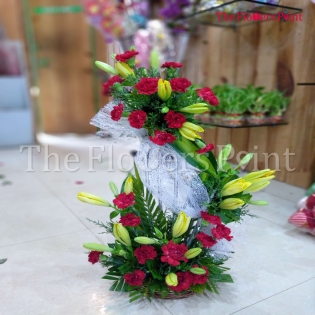Two Tier Lillies and Carnations Arrangement Delivered in Delhi