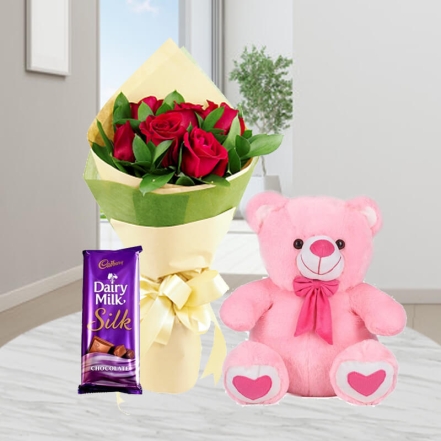 Cute Pink Teddy With Red Roses