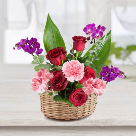 Beautiful Basket of Pink Carnations & Purple Orchids